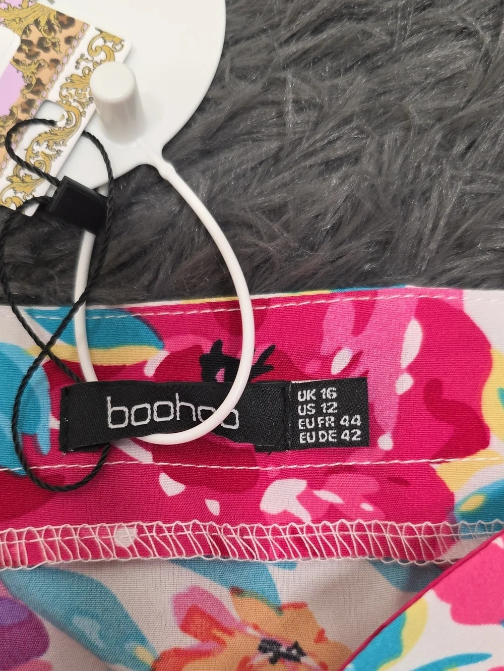 BooHoo- Floral Mini Skirt. Size 12. NWT